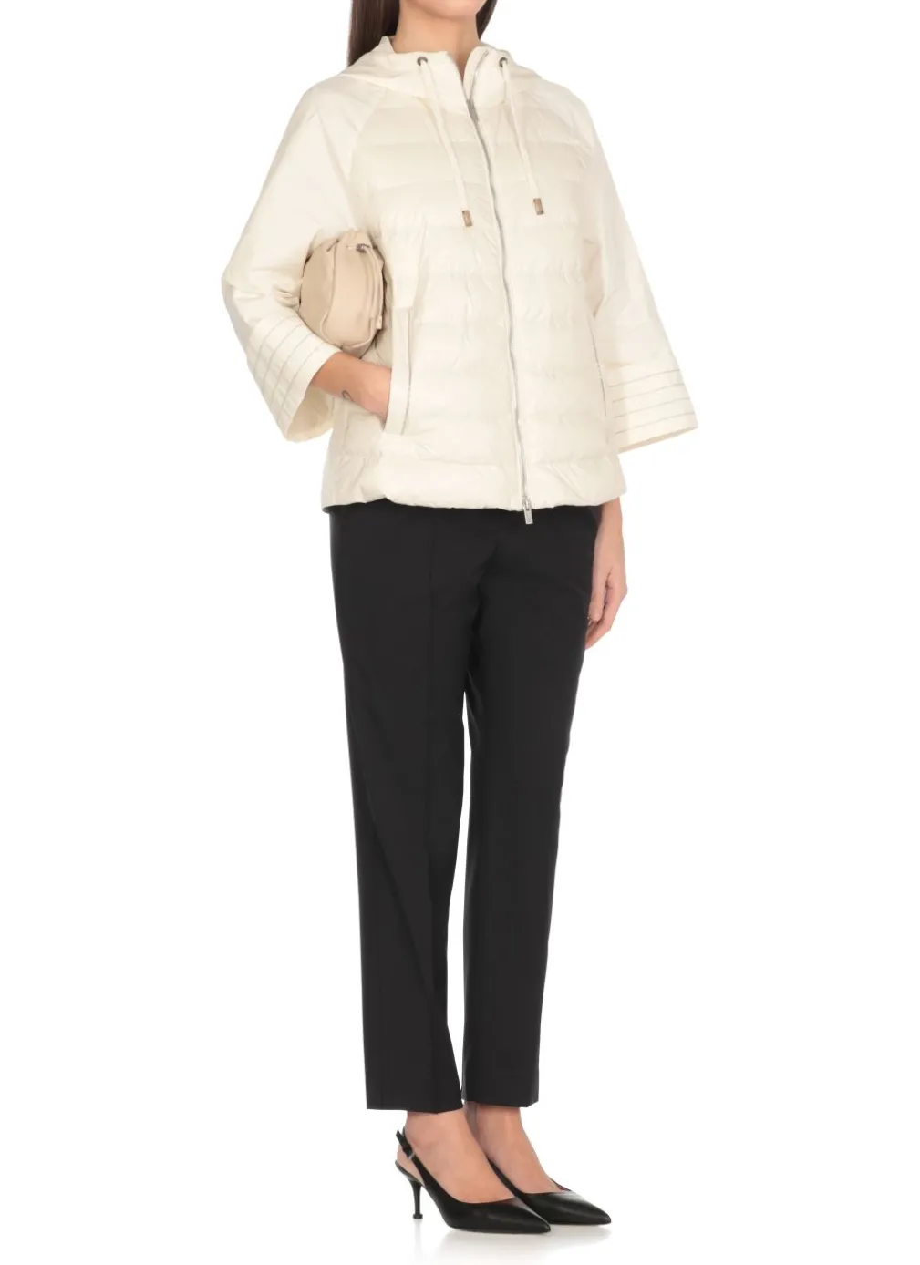 Piumino con dettagli in punto luce