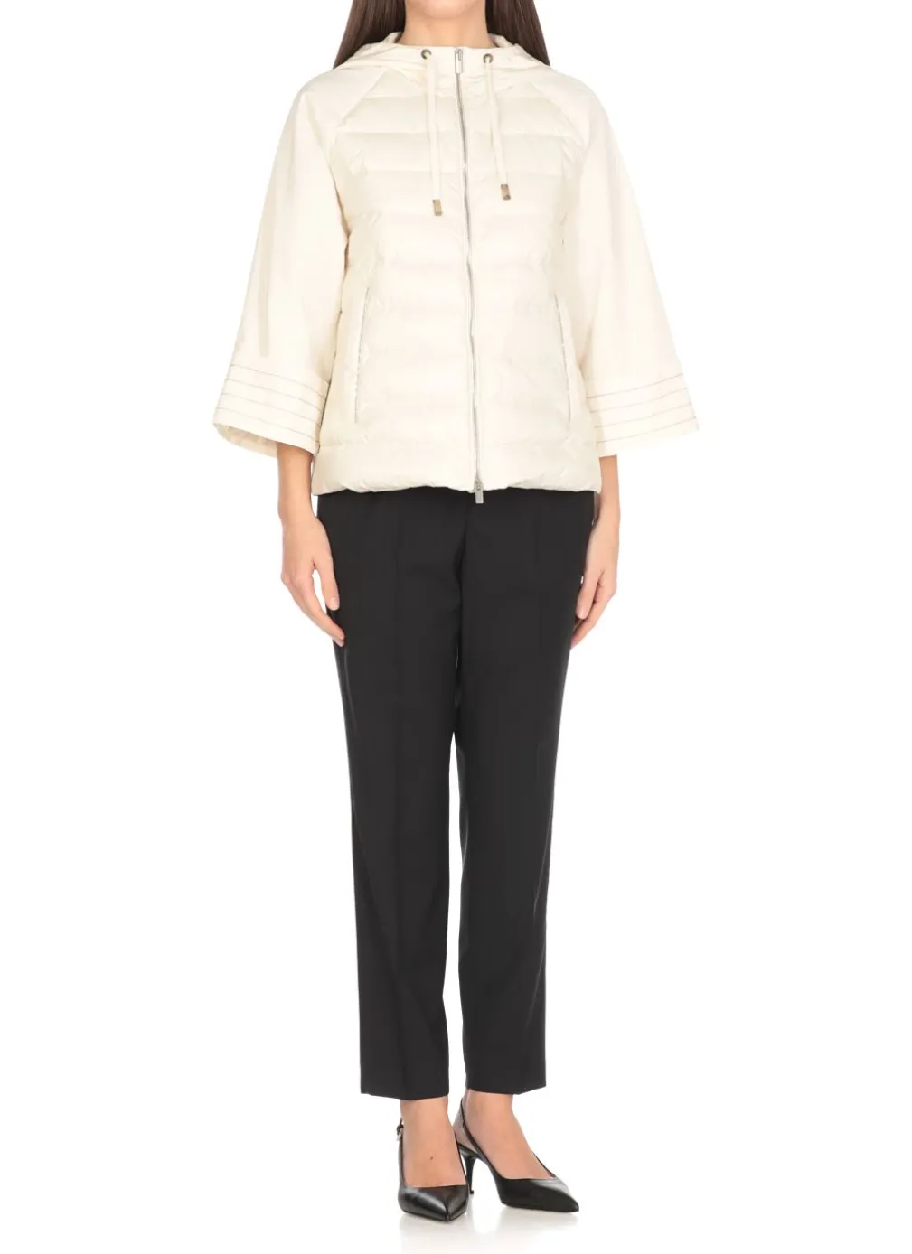 Piumino con dettagli in punto luce